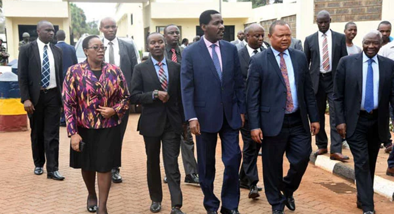 Cabinet Secretaries Sicily Kariuki (Health) Joe Mucheru (ICT) and Peter Munya (Industrialization) outside DCI offices