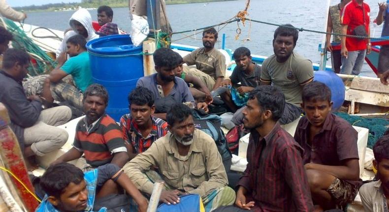Australia-bound Sri Lankan asylum-seekers are seen off western Sumatra, after being intercepted by Indonesian authorities