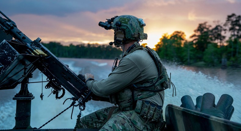 A US Naval Special Warfare combatant-craft crewman mans an M2 machine gun during an exercise near Bay St. Louis, Mississippi, April 25, 2022.