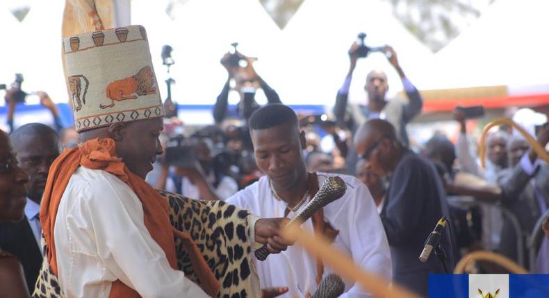 The Kabaka beats the Mujagozo drums as part of the coronation celebrations