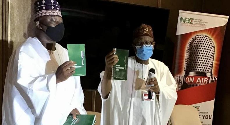 Minister of Information and Culture, Alhaji Lai Mohammed and the Acting Director-General of NBC, Prof. Armstrong Idachaba at the unveiling ceremony of the amended Broadcasting Code in Lagos. [NAN]