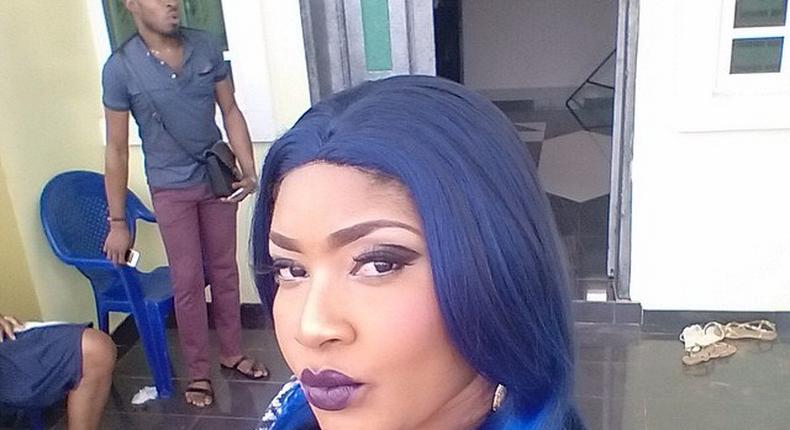 Nollywood actress, Angela Okorie, rocking blue hair