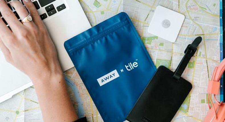 The Away x Tile luggage tag costs $30 and attaches to any piece of luggage.