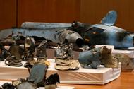 Remains of the missiles which Saudi government says were used to attack an Aramco oil facility, are displayed during a news conference in Riyadh