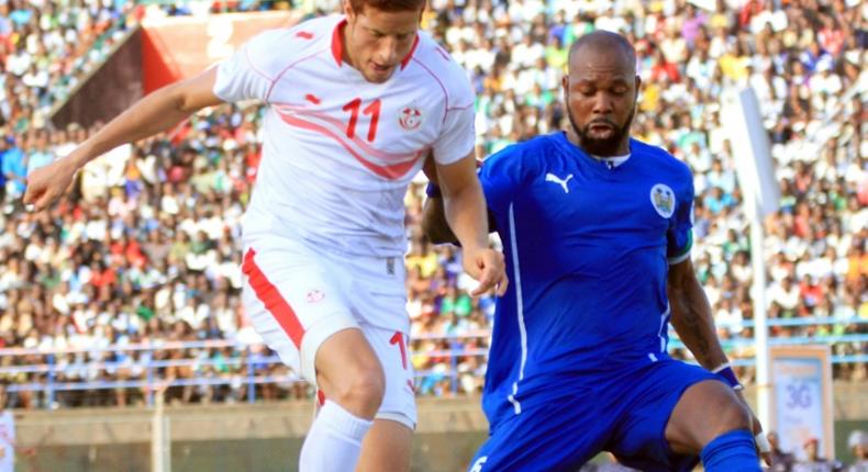 Former Sierra Leone captain Ibrahim Kargbo (R, pictured June 2013) is one of eight people FIFA banned for life for match manipulation