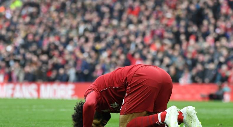 Liverpool's Egyptian forward Mohamed Salah celebrates after scoring a brilliant goal against Chelsea