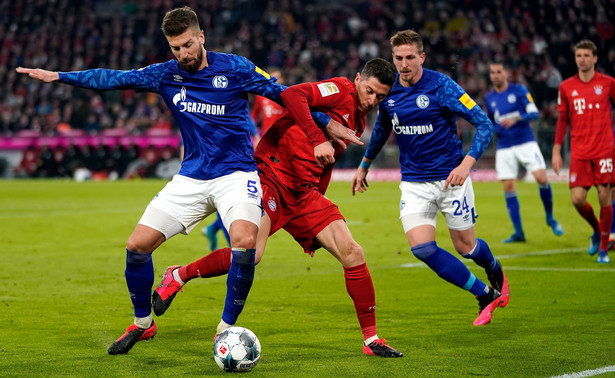 Matija Nastasic i Robert Lewandowski