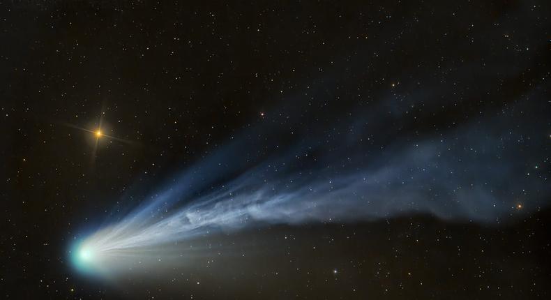 Comet 12P/Pons-Brooks glows green as it streaks through space with bright star Hamal shining in the background. You might be able to spot this comet during the total solar eclipse.Dan Bartlett