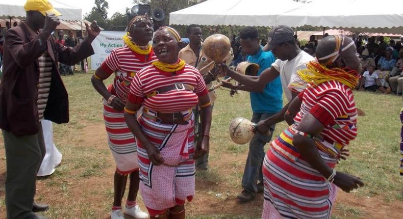 Members of the Kuria community engaging in a traditional dance