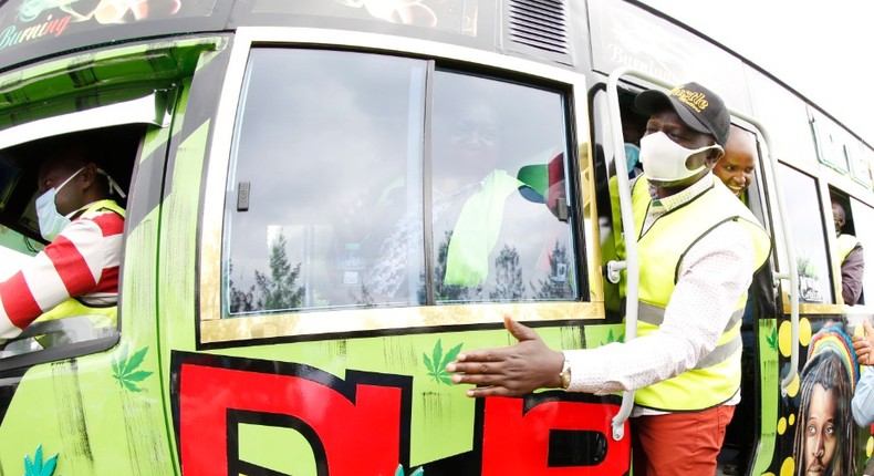 DP William Ruto hanging on a matatu during a recent interaction at his Karen residence