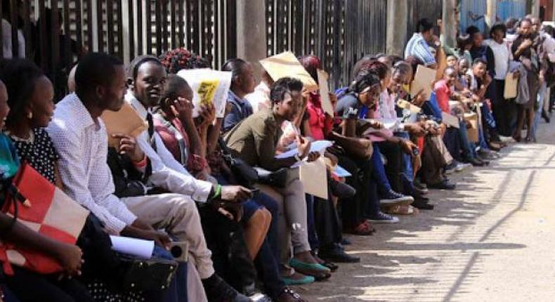 Jobseekers wait to hand in their documents during recruitment at County Hall in Nairobi, 2019