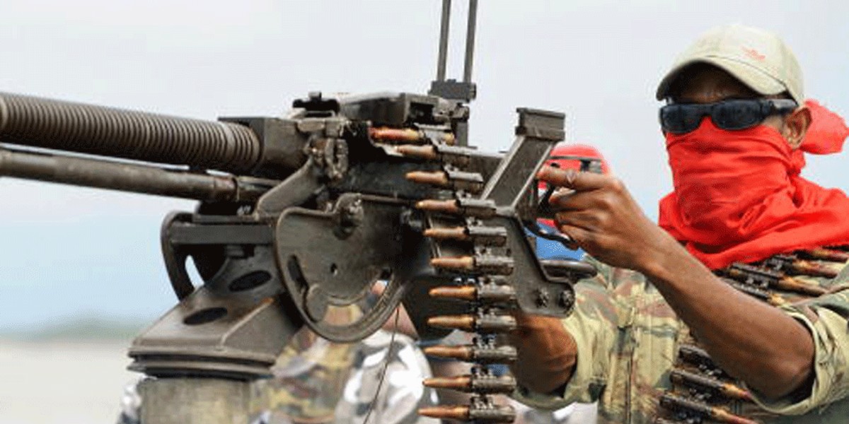 A fighter of the Movement for the Emancipation of the Niger Delta at the militia's creek camp in the Niger Delta in 2008.