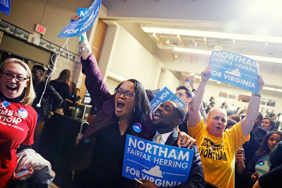Supporters of Ralph Northam, the Democratic candidate for Virginia governor, celebrate at an election-night rally in Fairfax.