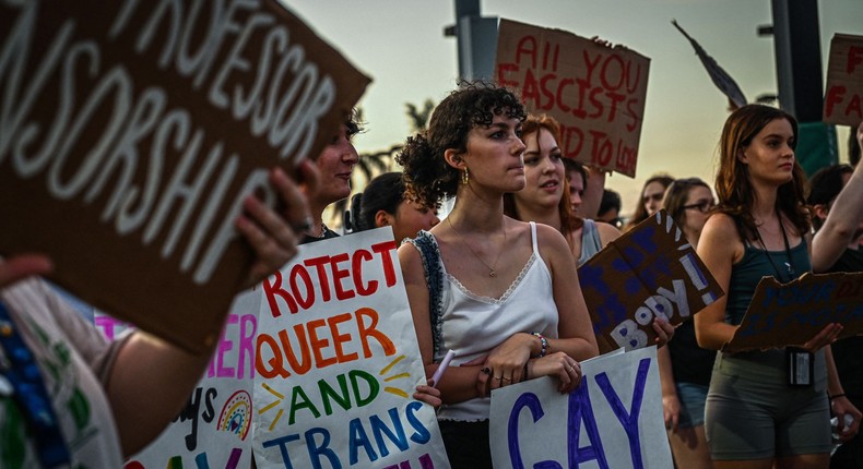 LGBTQ rights supporters protest against Florida Gov. Ron Desantis in Fort Myers, Florida.Giorgio Viera/AFP via Getty Images