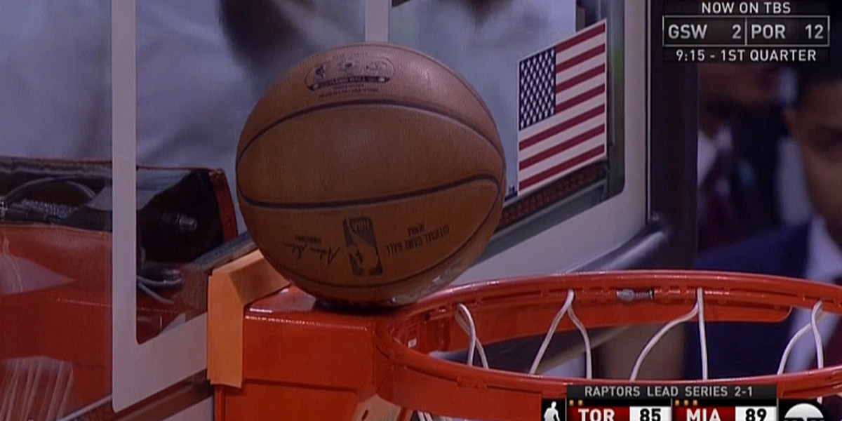 Dwyane Wade's potential game-clinching shot got stuck on the back of the rim