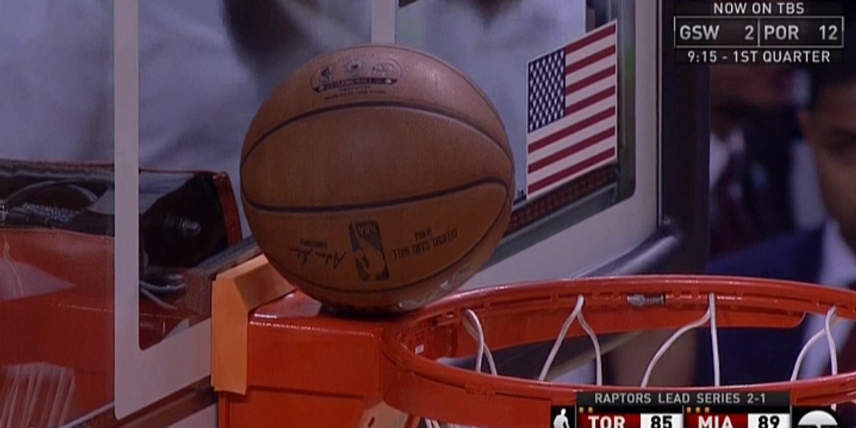 Dwyane Wade's potential game-clinching shot got stuck on the back of the rim