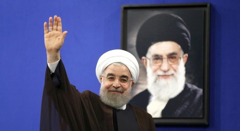 Newly re-elected Iranian President Hassan Rouhani gestures after delivering a televised speech in the capital Tehran on May 20, 2017