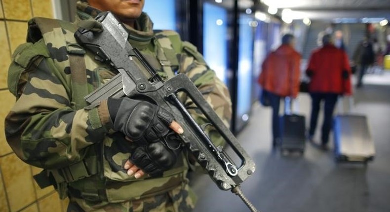 A French soldier patrols in the train station in Nantes, France, November 16, 2015 as security increases after last Friday's series of deadly attacks in Paris.   REUTERS/Stephane Mahe