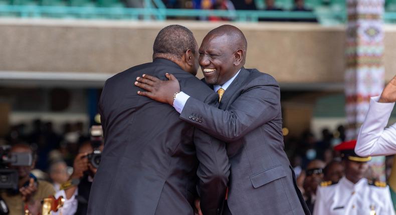 President William Ruto embraces former President Uhuru Kenyatta during the 5th president's inauguration at the Kasarani Stadium on September 13, 2022