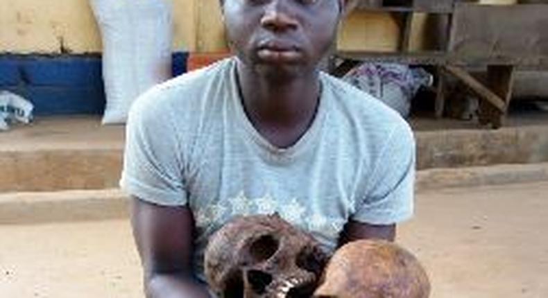 Man found in possession of two human skulls.
