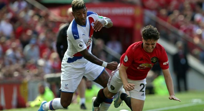 Manchester United midfielder Daniel James vies with Crystal Palace's Patrick van Aanholt