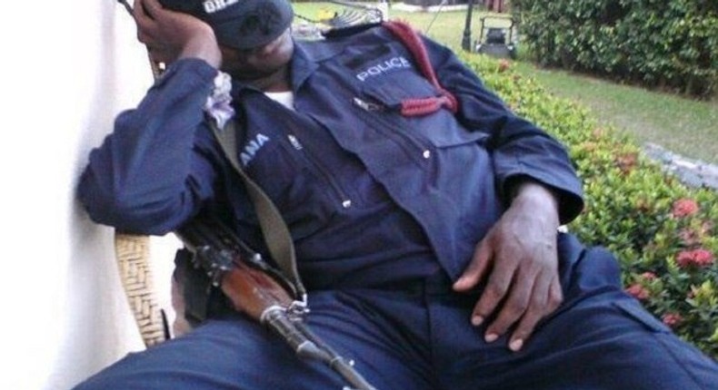 A tired Ghanaian police officer