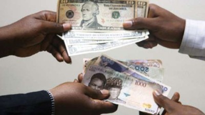 The naira sold for as low as ₦‎465 to the dollar within the day's trading (image used for illustration) [Punch]