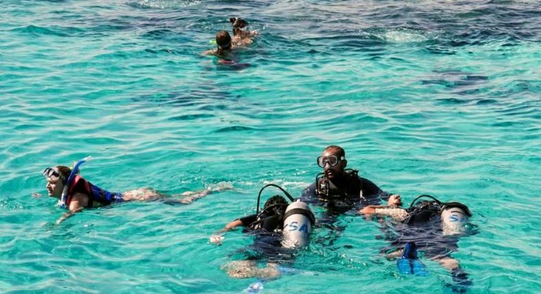 Tourists prepare to dive at the Egyptian Red Sea resort of Sharm el-Sheikh