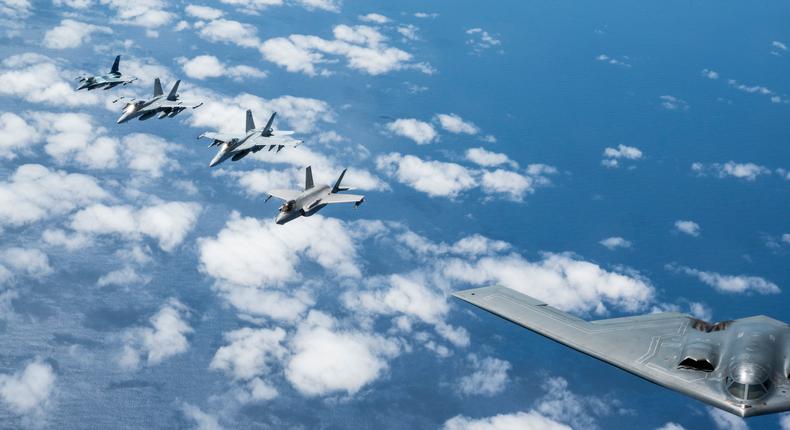 A U.S. Air Force B-2 Spirit from Whiteman Air Force Base, Missouri, flies in formation with a Royal Australian Air Force F-35A Lightning IIs, two EA-18 Growlers, two RAAF F/A-18F Super Hornets and two U.S. Air Force F-16C Aggressors from Eielson Air Force Base, Alaska during a training mission in the Indo-Pacific region.U.S. Air Force photo by Tech. Sgt. Hailey Haux