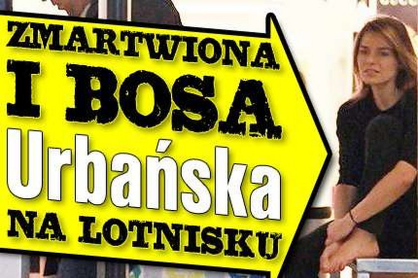 Zmartwiona i bosa Urbańska na lotnisku