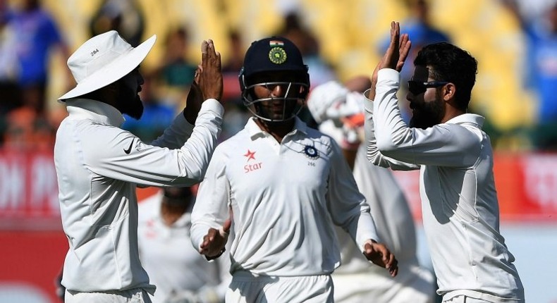 India's Ravindra Jadeja (right) celebrates the wicket of Australia's Pat Cummins on the third day of the fourth Test in Dharamsala on March 27, 2017