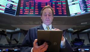 A trader works on the floor of the New York Stock Exchange (NYSE) in New York, U.S., March 9, 2020.Bryan R Smith