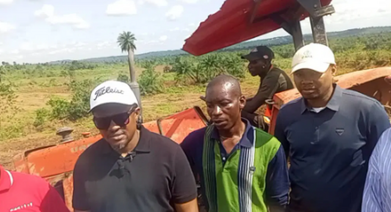 Cross River’s Commissioner for Agriculture, Johnson Ebokpo and other state officials inspecting ongoing land preparation for the cultivation of maize in Odukpani LGA