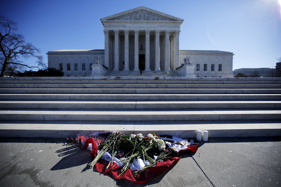 Flowers are seen in front of the Supreme Court building in Washington D.C. after the death of U.S. Supreme Court Justice Antonin Scalia, February 14, 2016.