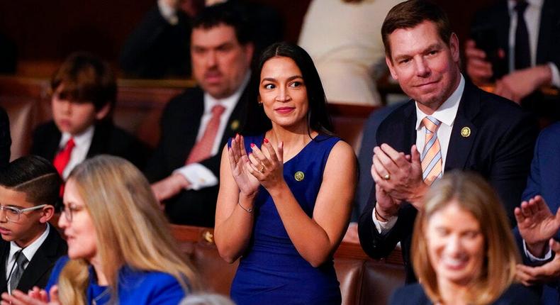 Rep. Alexandria Ocasio-Cortez of New York, center, listens during the vote for Speaker of the House on the opening day of the 118th Congress at the US Capitol on January 3, 2023.AP Photo/Alex Brandon