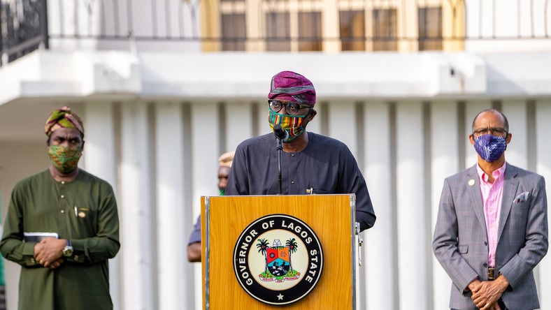 Lagos State governor, Babajide Sanwo-Olu, flanked by deputy governor, Obafemi Hamzat (left), and Commissioner for Health, Akin Abayomi (right) [Twitter/@babajidesanwoolu]