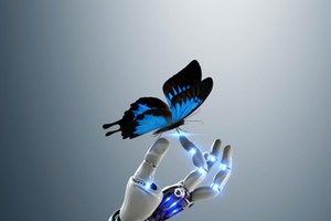 Robot hand holding butterfly