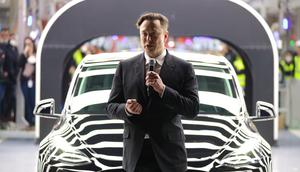 Elon Musk speaks at the opening of a new Tesla factory.Christian Marquardt - Pool/Getty Images