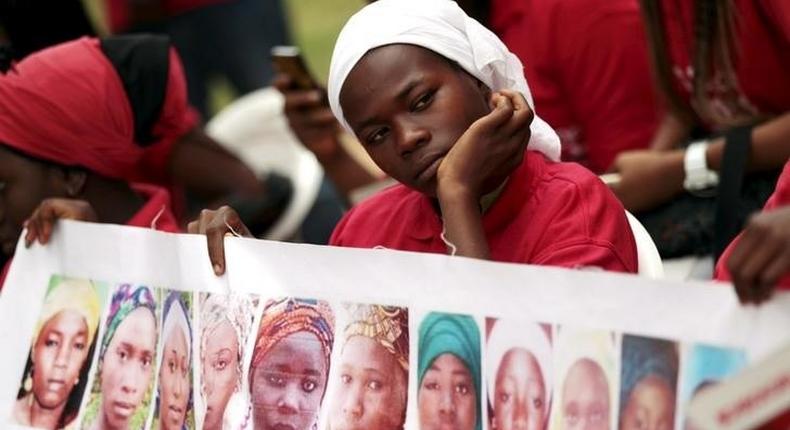 Bring Back Our Girls (BBOG) campaigners look on during a protest procession marking the 500th day since the abduction of girls in Chibok, along a road in Abuja August 27, 2015. REUTERS/Afolabi Sotunde