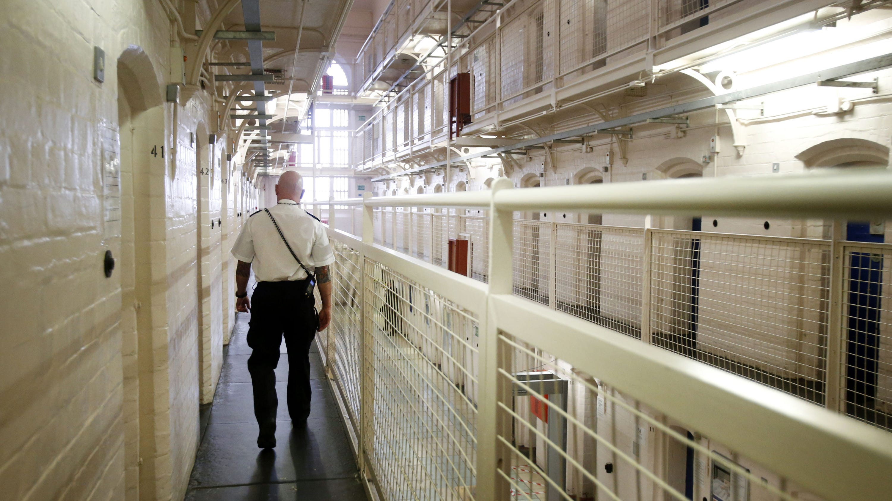 Murder charge for prisoner freed early under UK overcrowding scheme