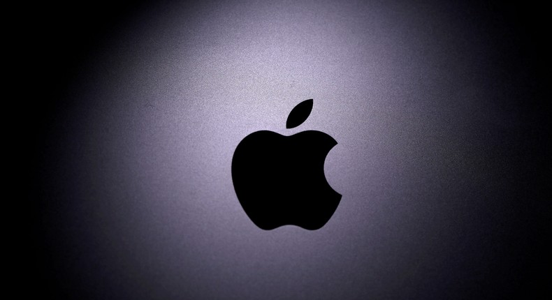 FILE PHOTO: Apple logo is seen on a Macbook in this illustration. Reuters