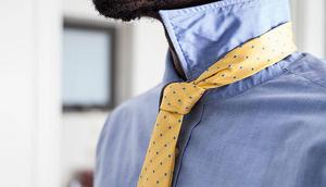 A man wearing a neck tie