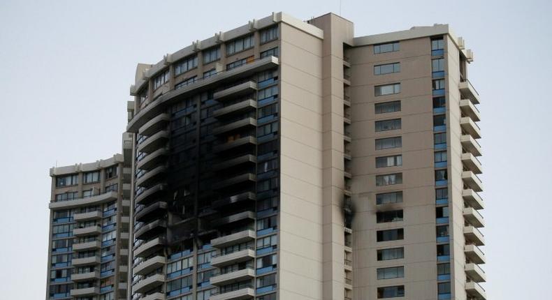 At least three people were killed and a dozen injured when a huge blaze burned through the Marco Polo apartment complex in Honolulu