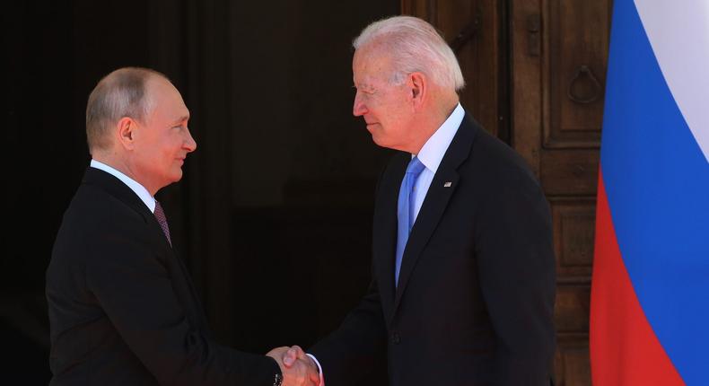 Russian President Vladimir Putin greets President Joe Biden during the US-Russia Summit 2021 at the La Grange Villa on June 16, 2021, in Geneva, Switzerland..
