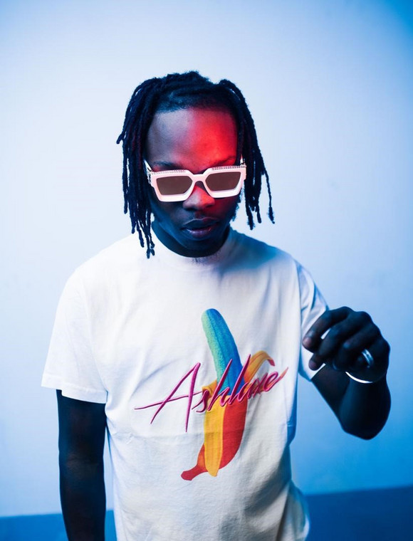 Naira Marley has reacted to the snitches online who he believes got him arrested for attending a house party.