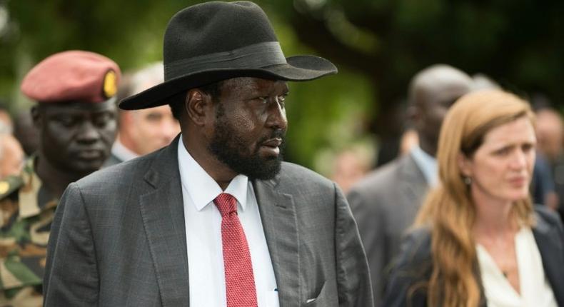 South Sudan President Salva Kiir (L) takes US Ambassador to the UN Samantha Power on a tour of the state house to show damage from fighting in July