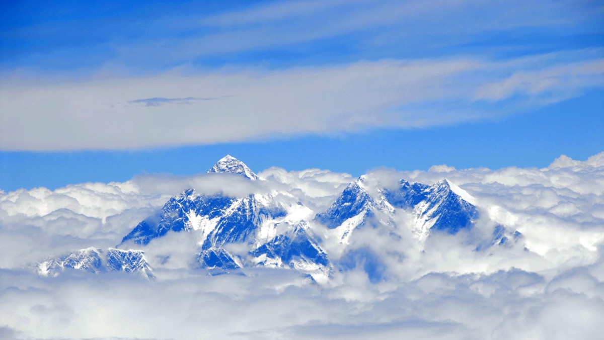 View from above on Mt. Everest surrounded by clouds Tibet China