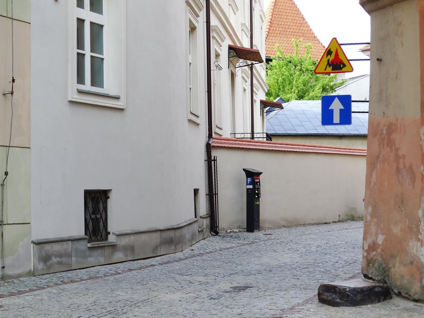 Znak z katem na Starym Mieście w Lublinie