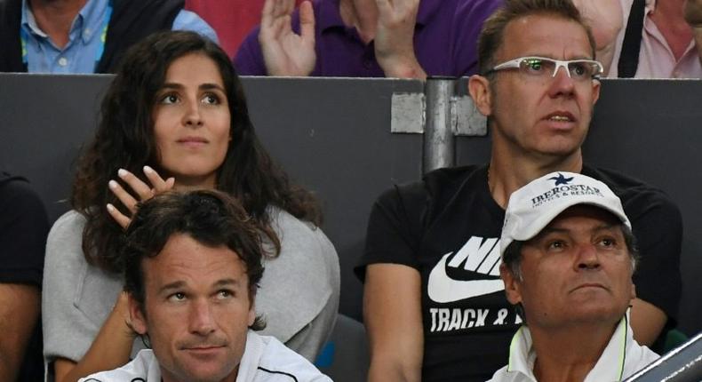 Toni Nadal (bottom R), uncle and coach of Spain's Rafael Nadal, watches him play against Bulgaria's Grigor Dimitrov during their Australian Open semi-final in Melbourne on January 27, 2017