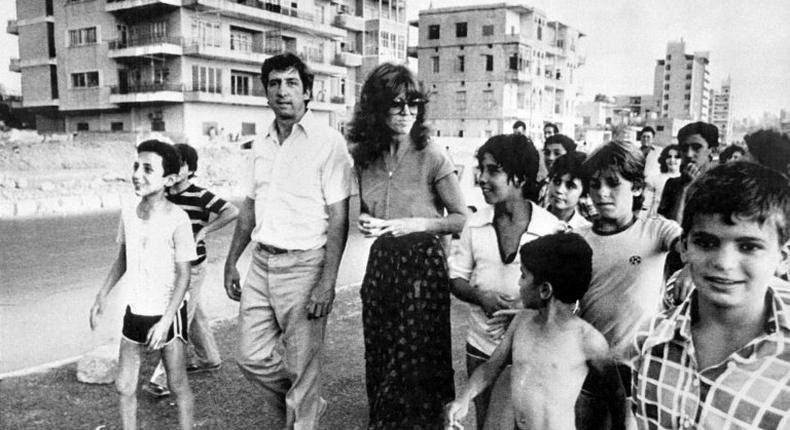 US peace activist Tom Hayden -- who was married to Jane Fonda from 1973 to 1990 -- meets refugees during a 1982 visit to the Lebanese coastal town of Saida